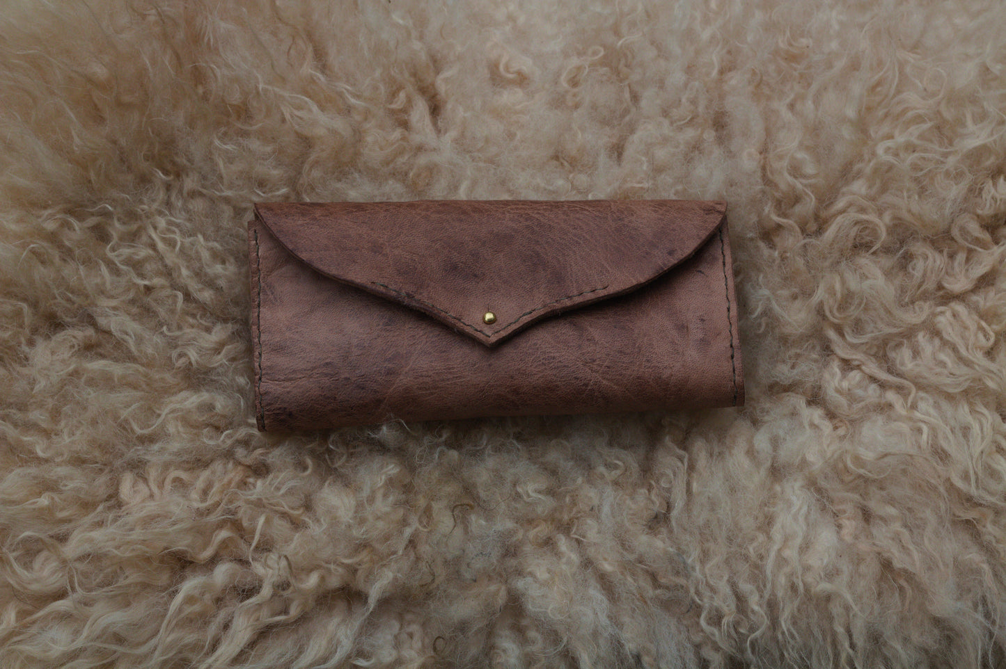 Deer leather clutches