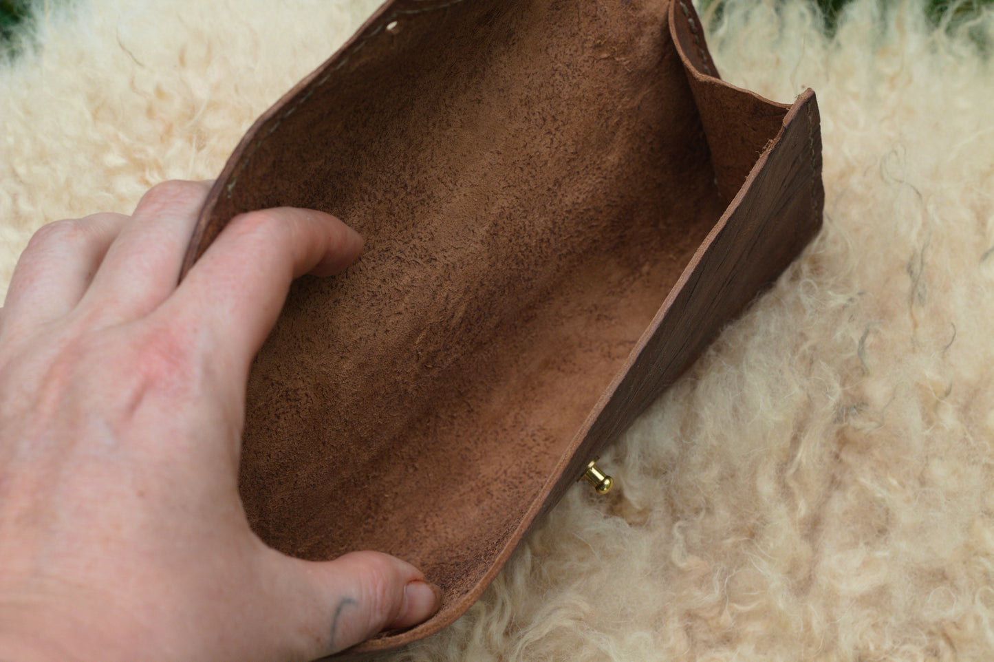 Deer leather clutches